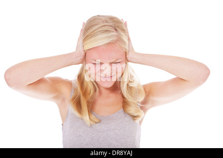 Young woman suffers from noise. All on white background. Stock Photo