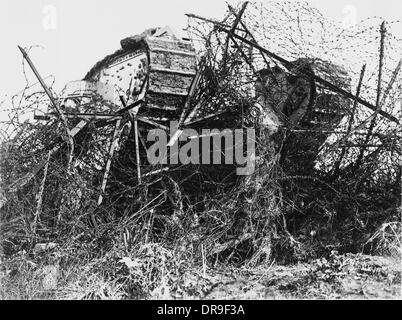 F1 tank passing through barbed wire, WW1 Stock Photo