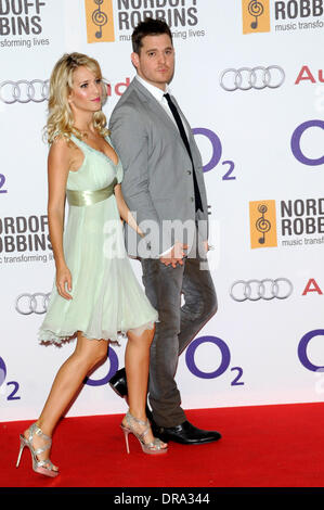 Michael Buble with his wife Luisana Lopilato  Nordoff Robbins Silver Clef lunch - Arrivals London, England - 29.06.12 Stock Photo