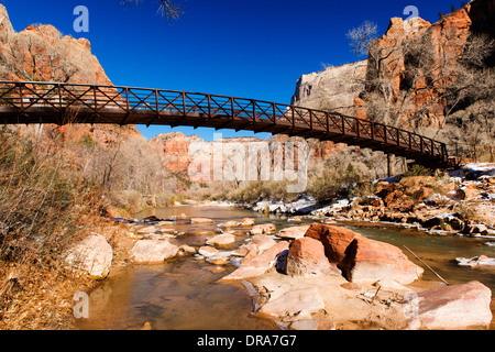 Footbridge over the Virgin River in Zion National Park at the start of winter. Stock Photo