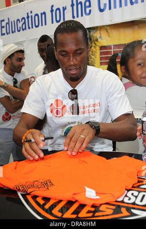 Didier Drogba Professional football players from the English Premier League host an event at Eaglerider Motorcycles in support of 'armsaroundthechild.org' Los Angeles, California - 01.07.12 Stock Photo