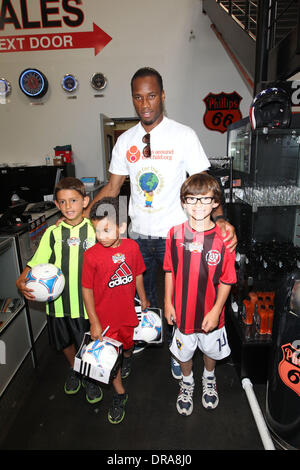 Didier Drogba Professional football players from the English Premier League host an event at Eaglerider Motorcycles in support of 'armsaroundthechild.org' Los Angeles, California - 01.07.12 Stock Photo