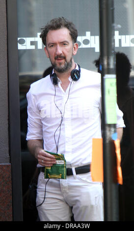 Director John Carney  on the set of 'Can a Song Save Your Life?' filming on location in Manhattan  The new movie centers around a dejected music business executive who ends up forming a friendship with a young singer-songwriter who is new to Manhattan.  New York City, USA - 02.07.12 Stock Photo