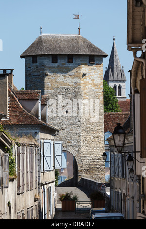 View down Rue du Pont-Vieux to the 14th century fortified bridge at Orthez, Aquitaine, France Stock Photo