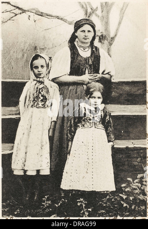 Russian peasant woman and two girls Stock Photo - Alamy