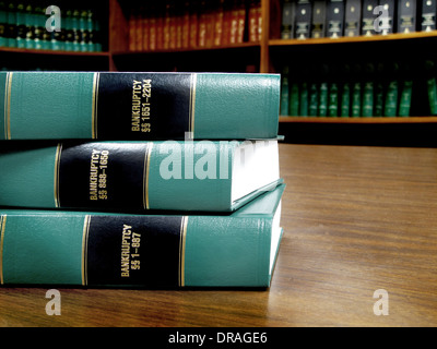 Close up of several volumes of law books of codes and statutes on bankruptcy Stock Photo