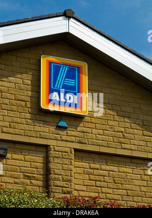 Sign outside Aldi budget supermarket which sells low cost items and has thrived during the UK economic downturn Stock Photo