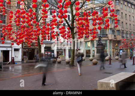 Manchester UK. 22nd January, 2014.  The City of Manchester prepares for the annual Chinese New year as  lanterns and decorations have been draped around St Anns Square, Manchester. Proceedings kicked off  in January with 3,000 Chinese lanterns hung across the city. Stock Photo