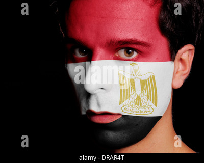 Flag of Egypt Painted on a Face of a Young Man Stock Photo