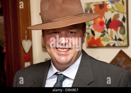 Dapper young man happy in his new fedora hat age 40. St Paul Minnesota MN USA Stock Photo