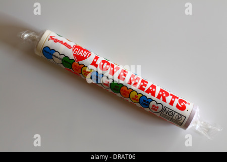 Tube of Giant Love Heart Sweets Stock Photo