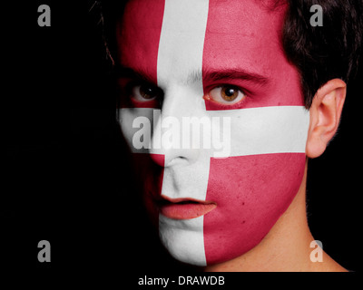Flag of Denmark Painted on a Face of a Young Man