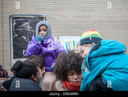 Students with their families and friends participate in their annual Martin Luther King Jr. Commemorative Walk Stock Photo