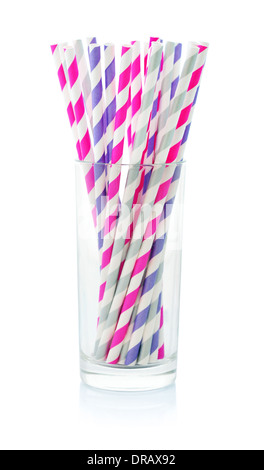 Striped drink straws of different colors in glass isolated on white background Stock Photo