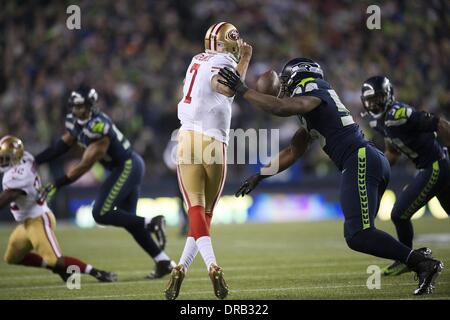 Seattle Seahawks linebacker Heath Farwell (55) sacks Chicago Bears  quarterback Jordan Palmer in the third quarter of a pre-season game at  CenturyLink Field in Seattle, Washington on August 22, 2014. The Seahawks