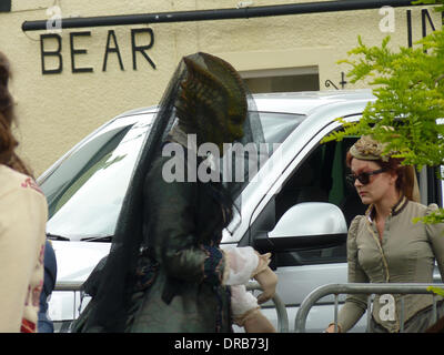 Neve McIntosh as Madame Vastra the Silurian. Shooting a scene for the BBC One Sci Fi series 'Doctor Who'. The episode entitled The Crimson Horror is reportedly written by Mark Gatiss.   Wales - 06.07.12 Stock Photo