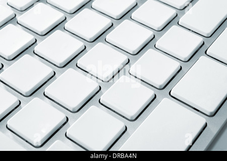 modern white computer keyboard with blank keys for your own idea. Stock Photo