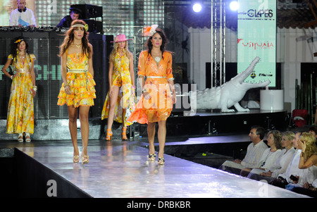 Adlib. A fashion show which takes place on the island of Ibiza. Different models parading on the catwalk with different clothes. Stock Photo