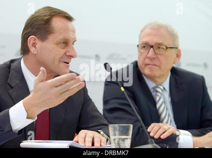Alfons Hoermann, president of the German Olympic Sports Confederation (DOSB, L) and general manager Michael Vesper speak during the press conference in Frankfurt/Main, Germany, 23 January 2014. The DOSB has nominated 151 athletes for the Winter Olympics in Sochi. Photo: Arne Dedert/dpa Stock Photo