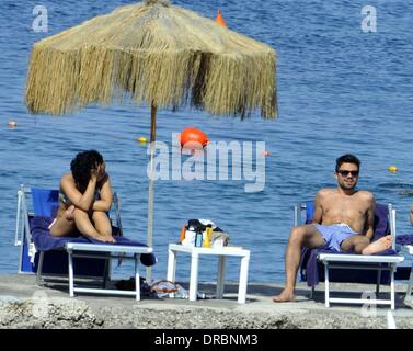 Dominic Cooper and his girlfriend Ruth Negga   sunbathing and enjoying a holiday in Ischia  Ischia, Italy - 11.07.12 Stock Photo