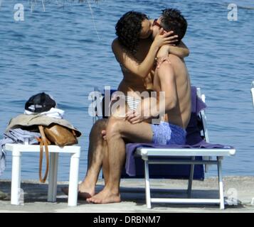 Dominic Cooper and his girlfriend Ruth Negga kissing,  sunbathing and enjoying a holiday in Ischia  Ischia, Italy - 11.07.12 Stock Photo