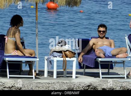 Dominic Cooper and his girlfriend Ruth Negga   sunbathing and enjoying a holiday in Ischia  Ischia, Italy - 11.07.12 Stock Photo