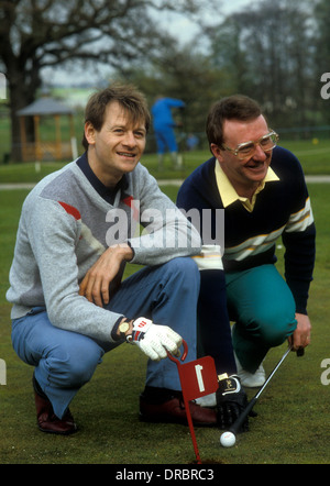 Alex Hurricane Higgins plays golf with Dennis Taylor after The Embassy World Snooker Tournament, Crucible Theatre Stock Photo