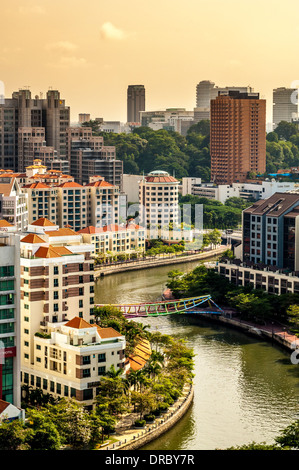 Singapore river and buildings with Alkaff Bridge (Singapore's ArtBridge) Stock Photo