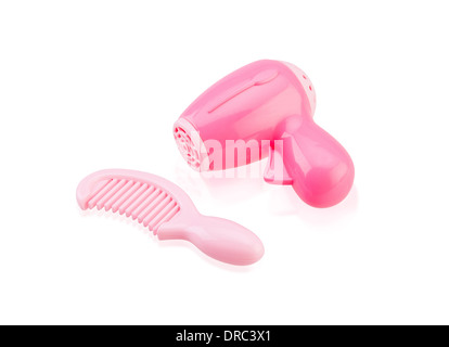 Cute toy hair dryer and comb isolated on white background Stock Photo
