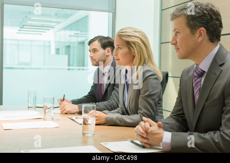 Business people sitting in meeting Stock Photo
