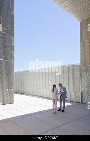 Business people talking outdoors Stock Photo