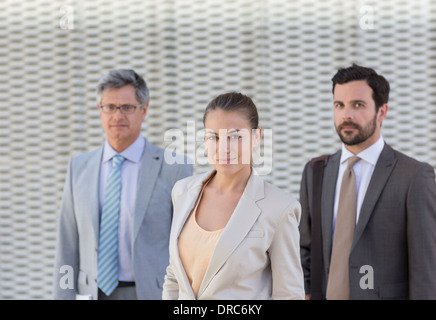 Business people smiling outdoors Stock Photo