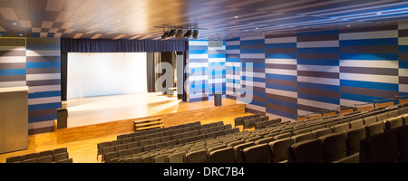 Seats and stage in empty auditorium Stock Photo