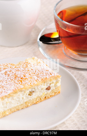 Curds shortbread with tea and sugar bowl on the table Stock Photo