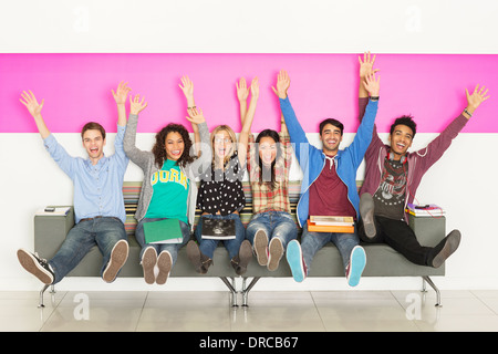 University students cheering Stock Photo