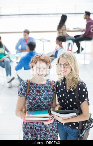University students smiling in lounge Stock Photo