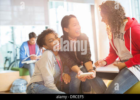 University students talking in lounge Stock Photo