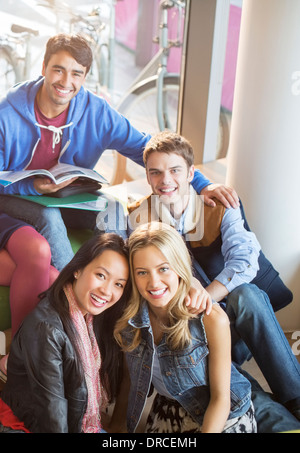 University students smiling in lounge Stock Photo