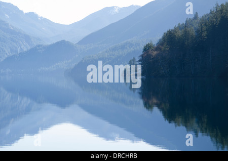 Mountains reflected in calm lake Stock Photo