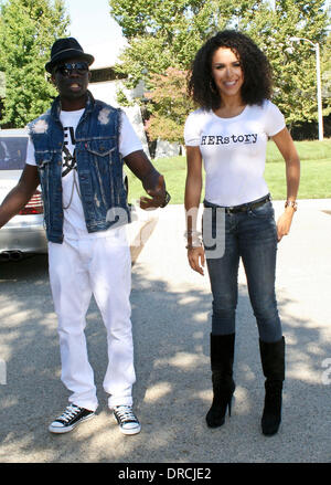 Brittany Bell and Sam Sarpong Supermodel Sam Sarpong and Miss Arizona USA 2010 Brittany Bell on a fashion shoot for the 46664 clothing brand at Paramount Ranch Agoura Hills, California, USA - 17.07.12 Stock Photo