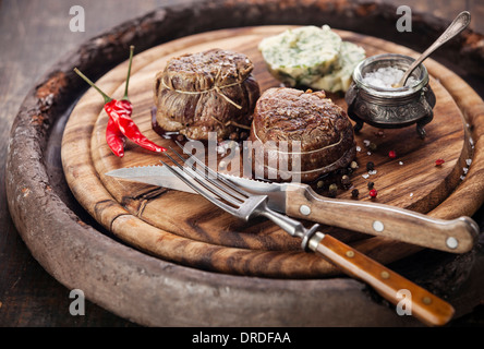 Beef steak filet mignon and butter with herbs Stock Photo