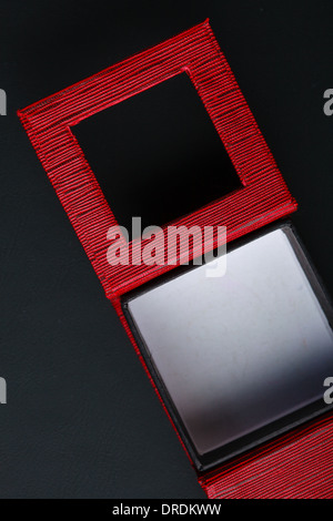Red black rectangular ring jewellery box on dark background Stock Photo