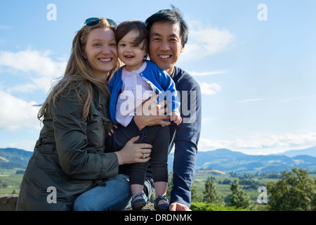 Mixed race family of three Stock Photo