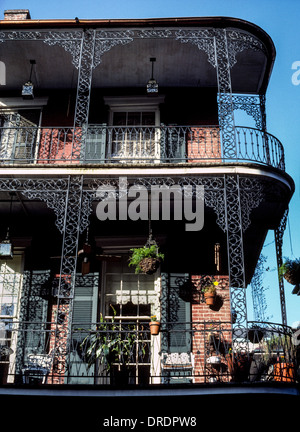 Balconies of decorative wrought iron rather than wooden pillars are much admired in the Old South city of New Orleans, Louisiana, USA. Stock Photo