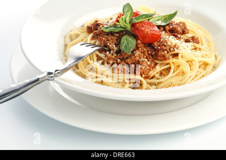 Spaghetti Bolognese on white background Stock Photo