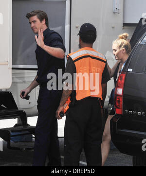 Miley Cyrus visits Liam Hemsworth on the set of his new film 'Paranoia' in Philadelphia Philadelphia, Pennsylvania - 31.07.12 Stock Photo