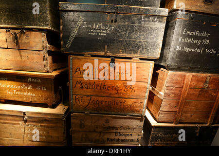 Hof, Germany. 24th Jan, 2014. Boxes for the transport of resettlement goods are on display in the Special Department 'Refugees and displaced persons' in the Museum Bayerisches Vogtland in Hof, Germany, 24 January 2014. The city of Hof presented new plans for the museum at a press conference. Photo: DAVID EBENER/dpa/Alamy Live News Stock Photo