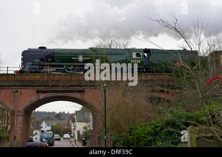 Reigate, Surrey. Friday 24th January 2014. The VS Orient Express Steam Locomotive BR(S) Merchant Navy Clan Line Class 4-6-2 No 35028 'Luncheon Excursion' speeds across a bridge in Reigate in Surrey, 1510hrs Friday 24th January 2014 en route to London Victoria. Credit:  Photo by Lindsay Constable/  Alamy Live News
