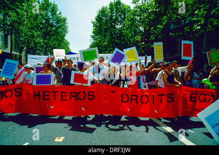 Paris, France, Crowd of People at Gay Pride March Parade, Center LGBTQ Marching With Signs and Banners Demanding Equality, 1998 Against discrimination, lgbt parade banner Stock Photo
