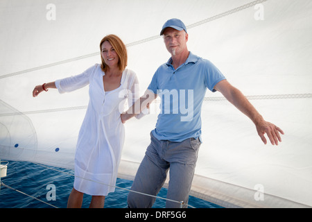 Mature couple on sailboat, having fun, Adriatic Sea, Croatia Stock Photo